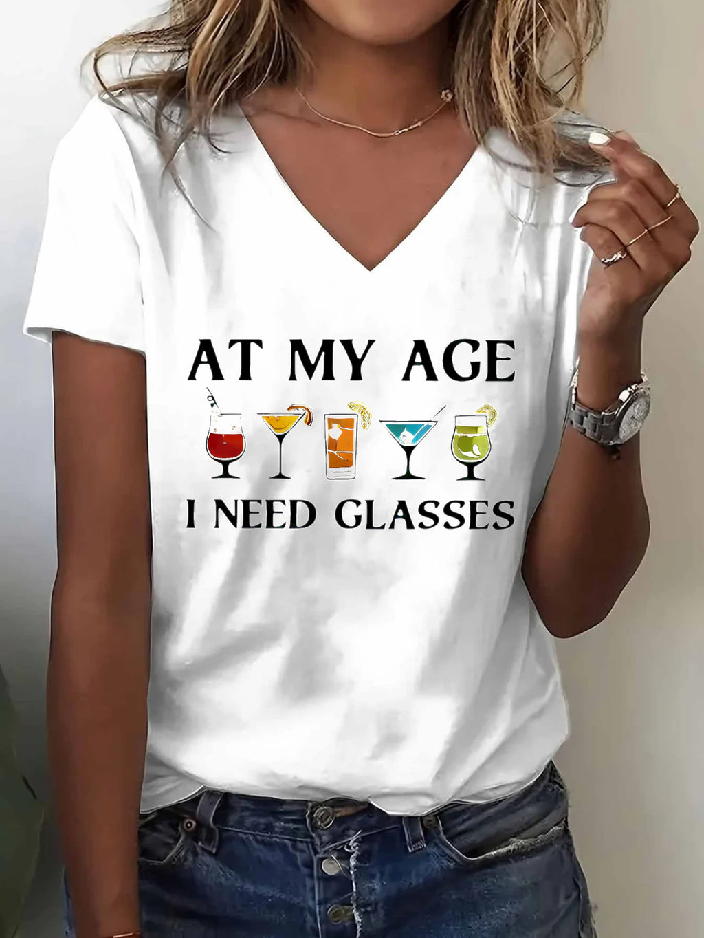 Funny Graphic T-Shirt Women White V-Neck Wine Glasses Humor Tee "At My Age I Need Glasses" S-XXL